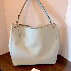 Light blue Leather Kate Spade bag.